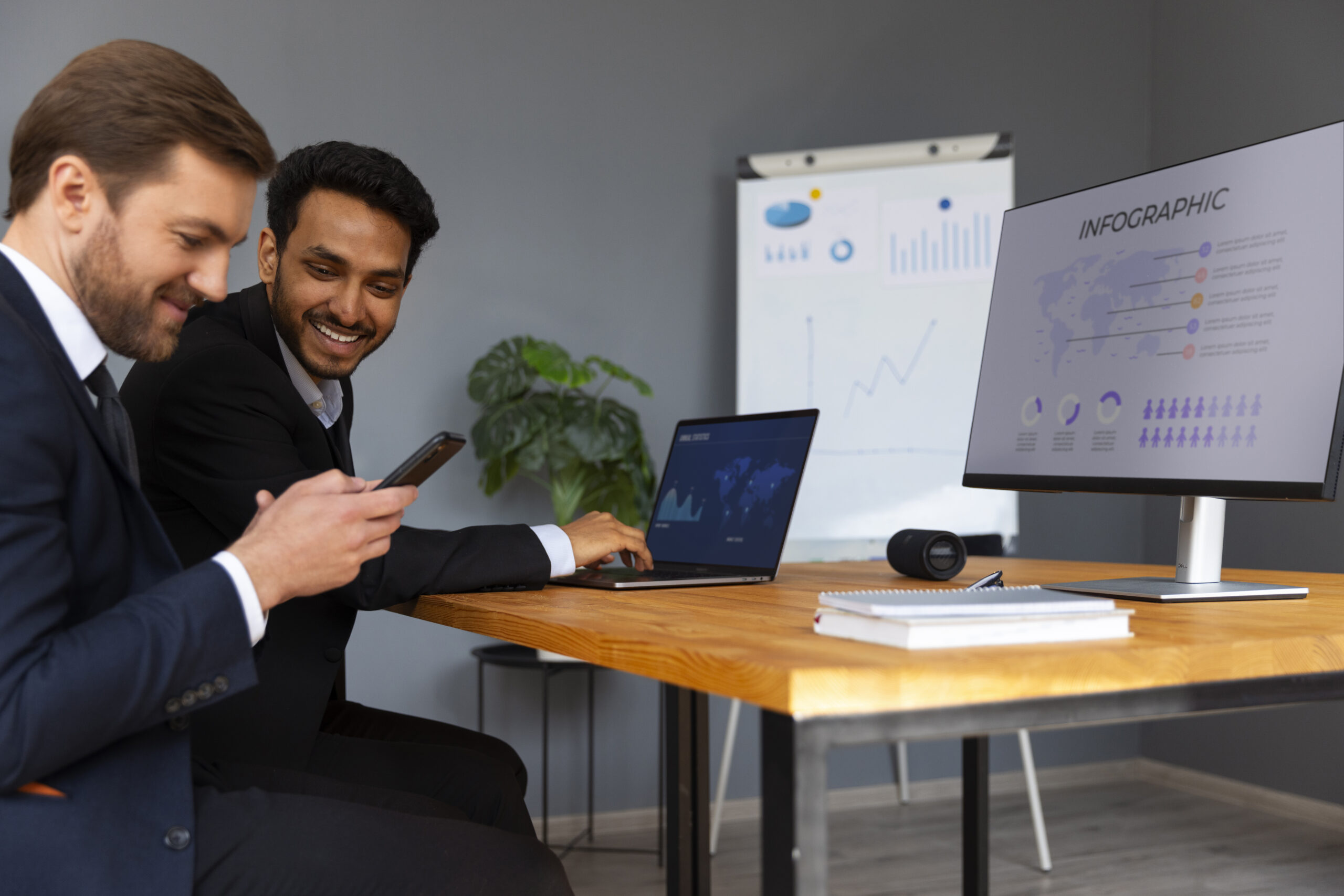 business-person-looking-finance-graphs | UpRango B2B SEO Agency in India